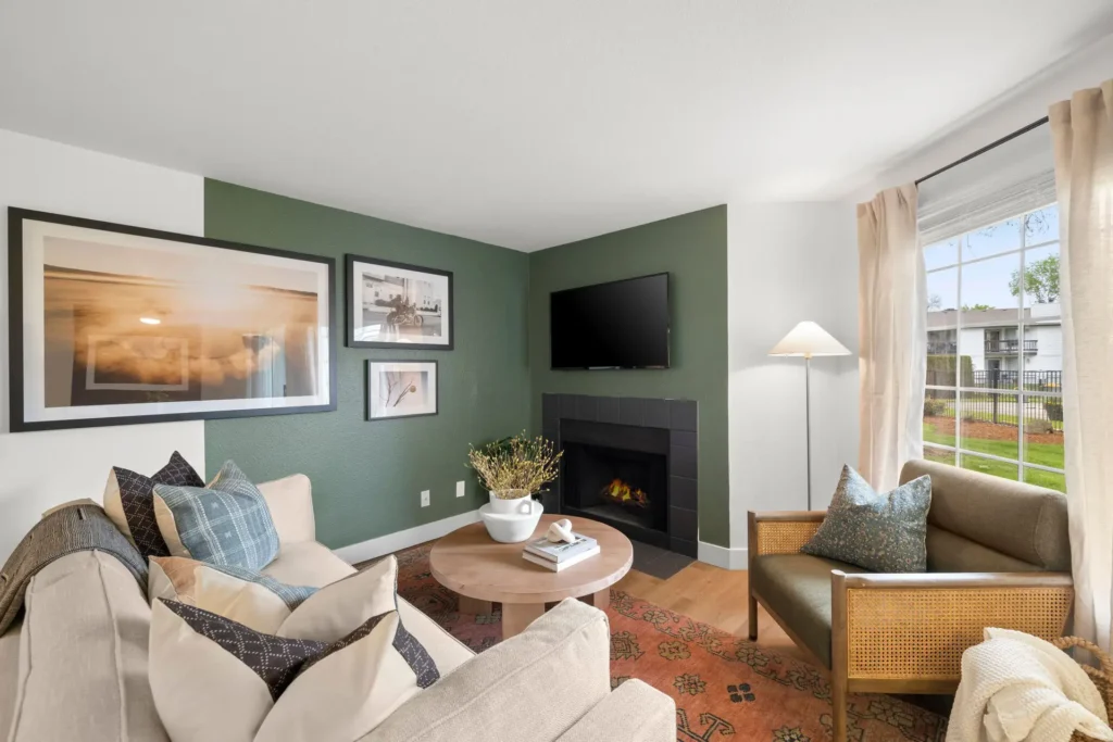 living area with fire place and large windows